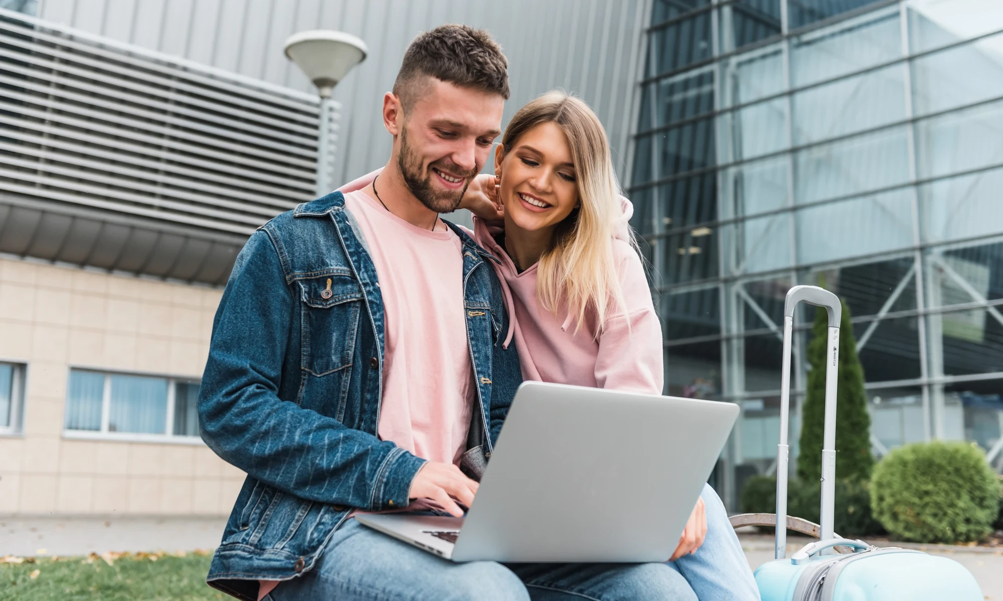 couple sharing laptop 